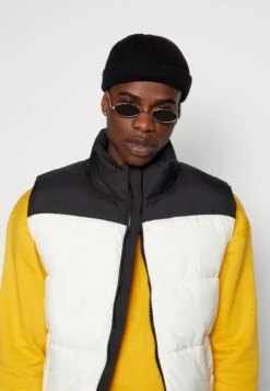 YOURTURN Puffer Vest Unisex - Bodywarmer - Black/White -Yourturn Verkoopwinkel 15fb2b9461114cf3bc4b9370605dc900