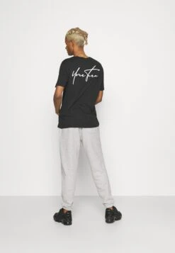 YOURTURN Unisex - Trainingsbroek - Mottled Light Grey 9 YOURTURN Unisex - Trainingsbroek - Mottled Light Grey -Yourturn Verkoopwinkel 44af697d8af34693a7b3385401313f6d